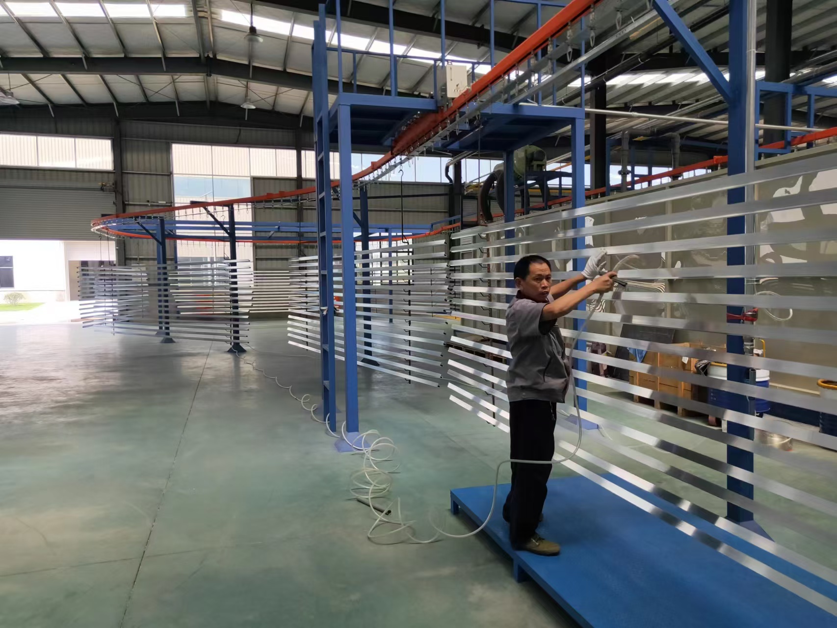 Intelligent Automated Production Line for Horizontal Spray Coating of Aluminum Profiles