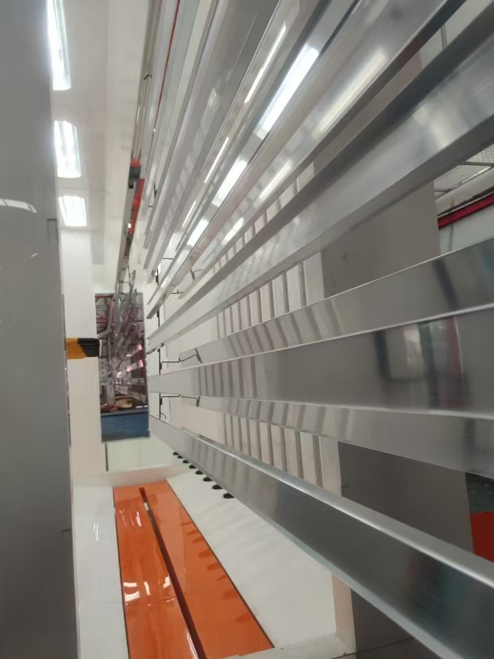 Intelligent Automated Production Line for Horizontal Spray Coating of Aluminum Profiles